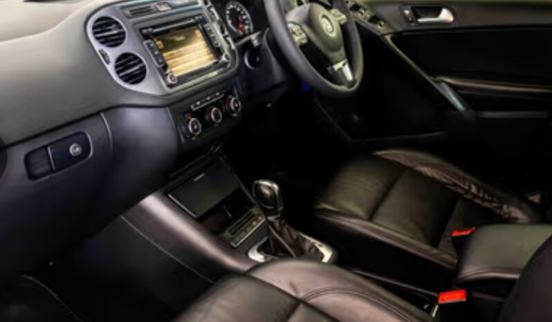 
								VW Tiguan II 1.4 TSi BlueMotion Trend and Fun DSG (110 kW) 2013 full									